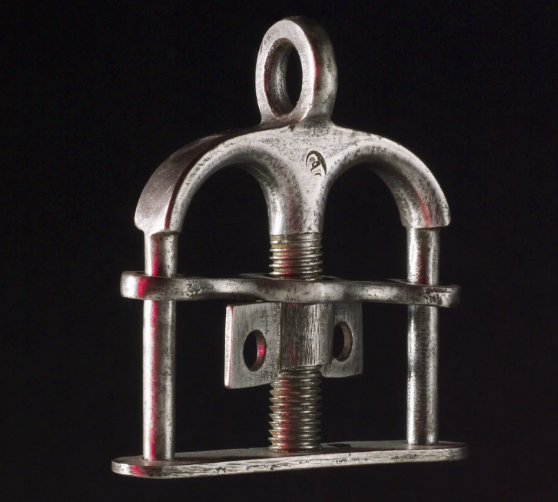 “Thumbscrews were torture instruments. They made prisoners reveal information or ‘confess’ to crimes. The thumb was placed between the screw and the metal plate at the bottom. The screw was then tightened. The thumb could be reduced to a bloody pulp if enough pressure was applied. Prisoners were also hoisted up by their thumbs. The prisoner was often subjected to the thumbscrews before even more painful forms of torture were used. These included the rack, where limbs were stretched and broken."